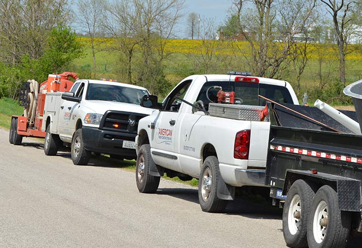 service trucks parked along roadside