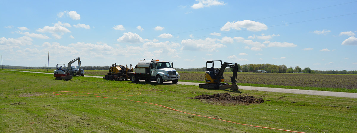 construction crew installing cable